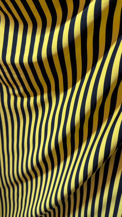 Stripe design print on poly spandex 4way stretch 58/60" sold by the yd. Ships worldwide from Los Angeles California USA. High quality fabric