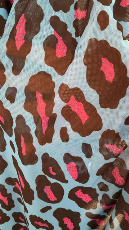 Exotic Leopard design Turquoise/Pink print on nylon spandex and power mesh nylon spandex  4-way stretch Green /black 58/60” Sold by the YD.