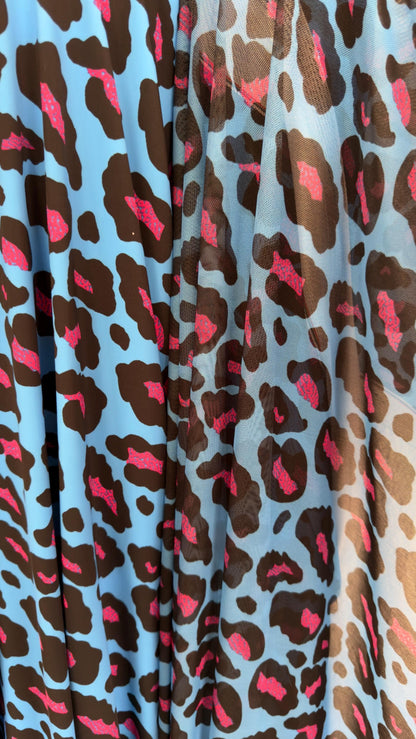 Exotic Leopard design Turquoise/Pink print on nylon spandex and power mesh nylon spandex  4-way stretch Green /black 58/60” Sold by the YD.