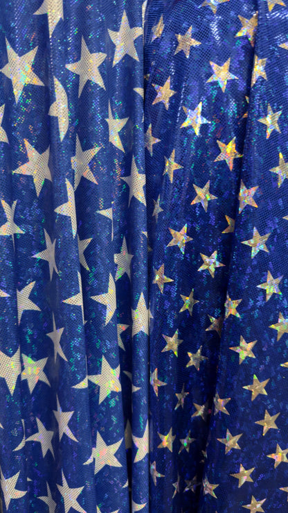 Stars Freedom design 2 sizes on metallic shattered glass hologram nylon spandex 4-way stretch 58/60” Multicolor Sold by the YD.