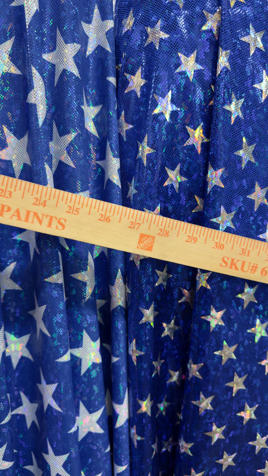 Stars Freedom design 2 sizes on metallic shattered glass hologram nylon spandex 4-way stretch 58/60” Multicolor Sold by the YD.