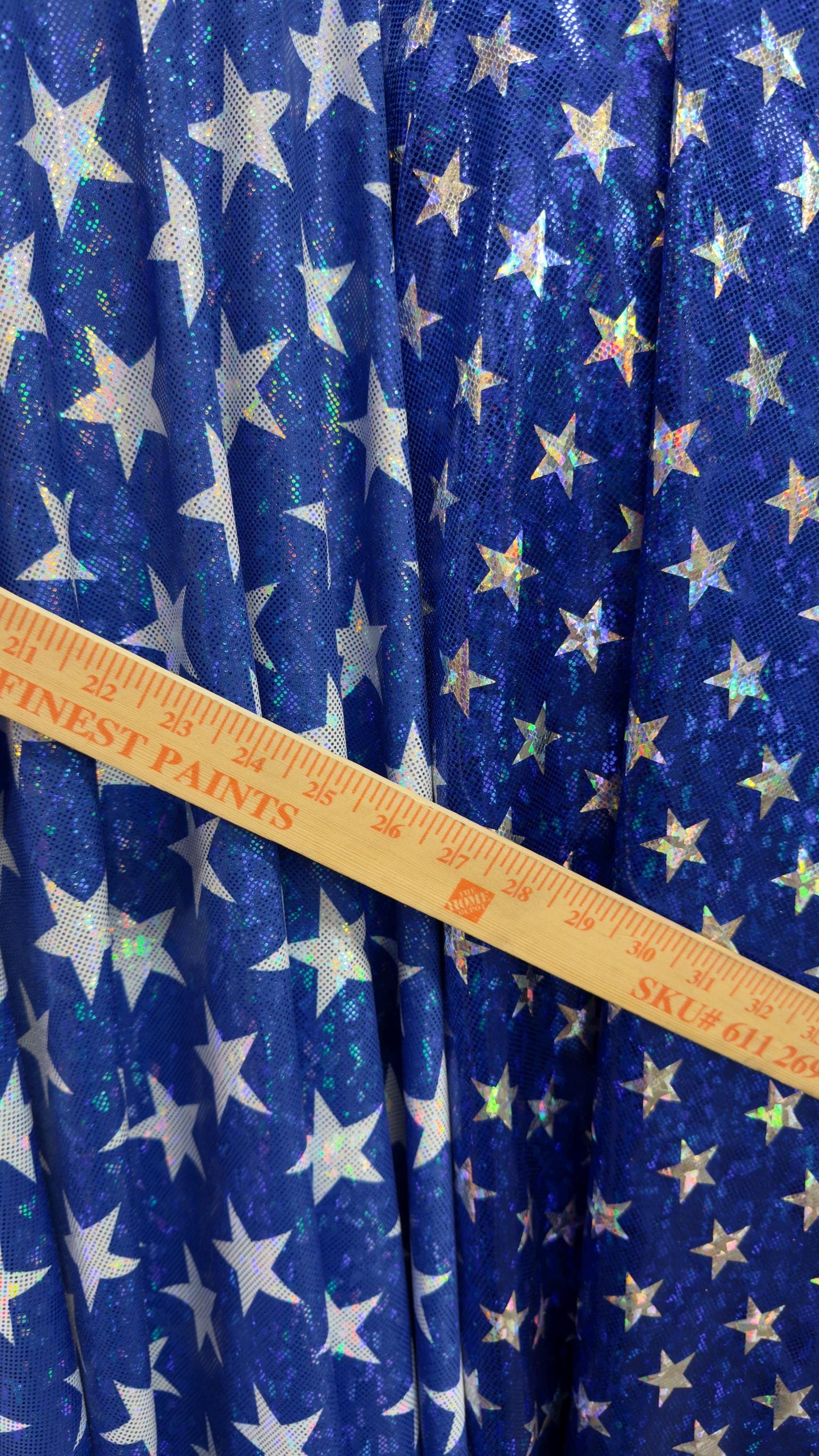 Stars Freedom design 2 sizes on metallic shattered glass hologram nylon spandex 4-way stretch 58/60” Multicolor Sold by the YD.