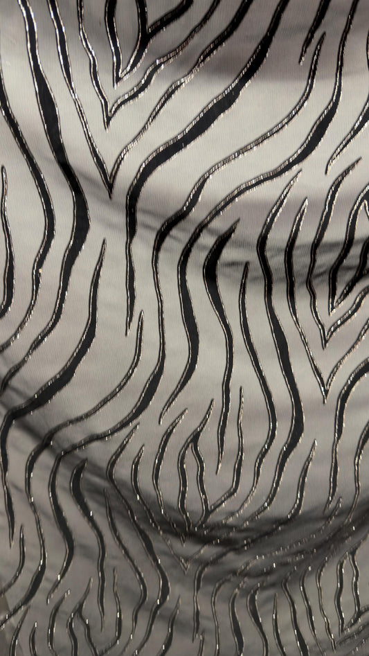 Exotic Tiger design on stretch mesh nylon spandex with flocking 4-way stretch 58/60” Sold by the YD. Ships Worldwide from Los Angeles CA USA