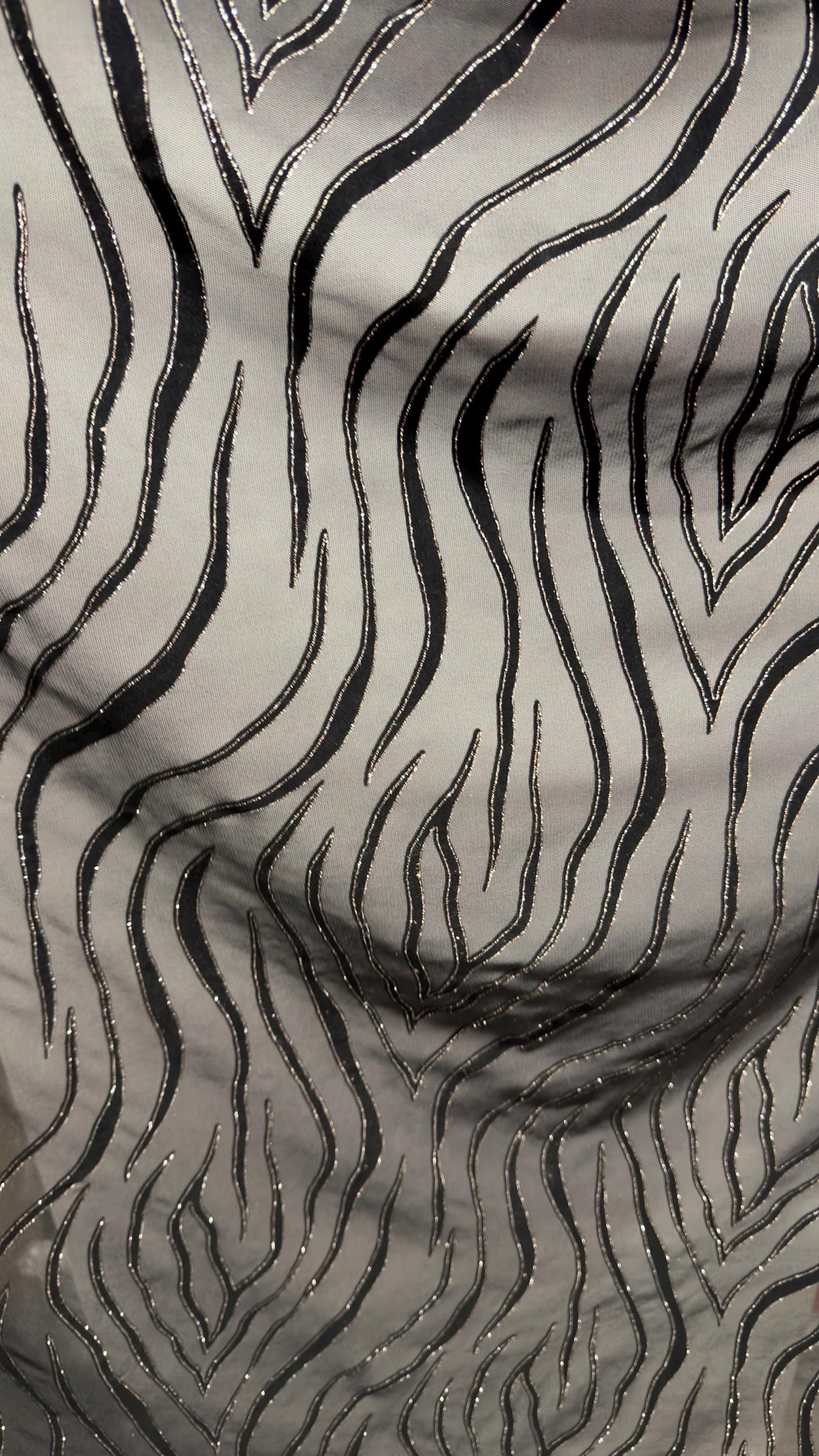 Exotic Tiger design on stretch mesh nylon spandex with flocking 4-way stretch 58/60” Sold by the YD. Ships Worldwide from Los Angeles CA USA