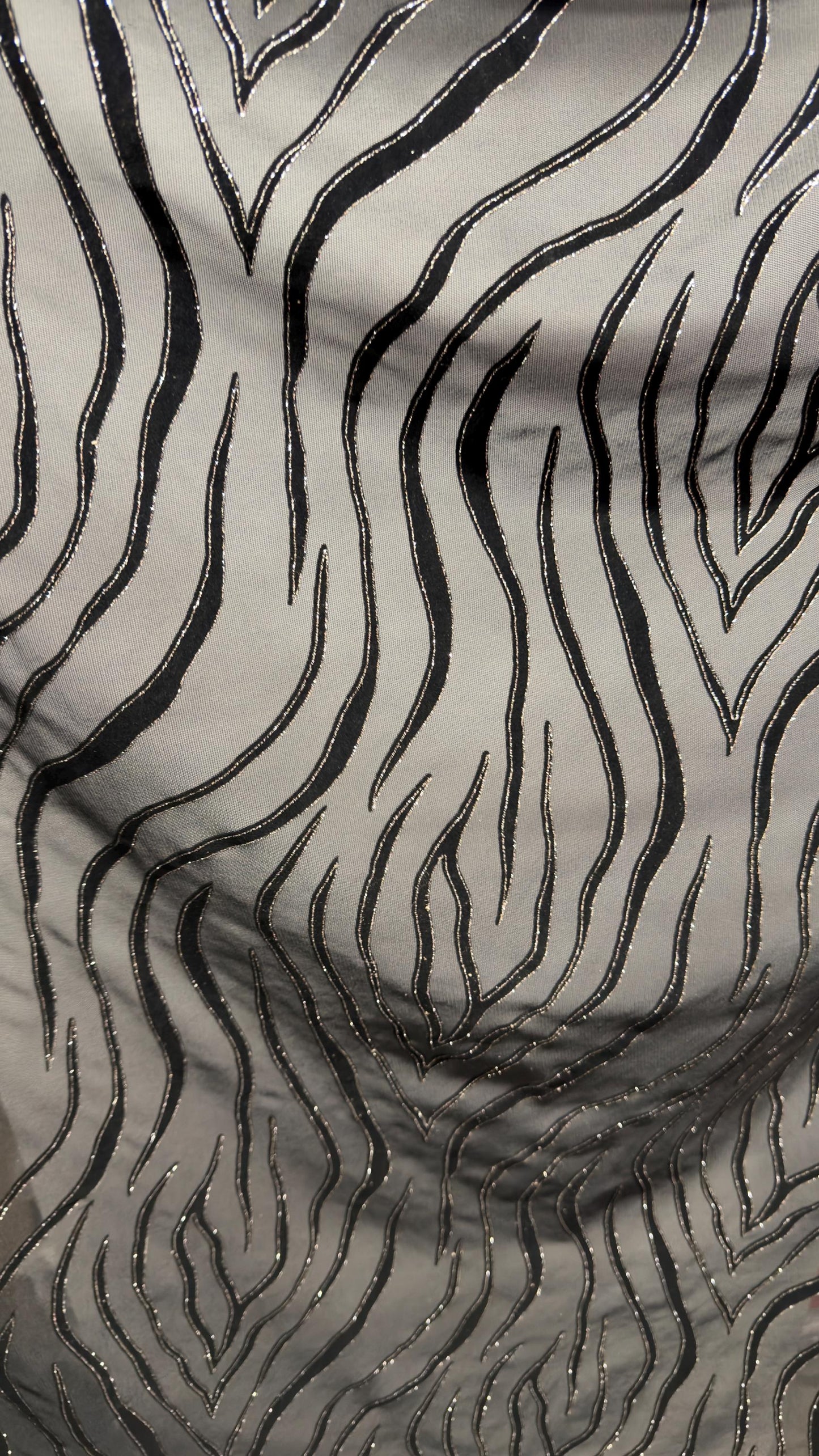 Exotic Tiger design on stretch mesh nylon spandex with flocking 4-way stretch 58/60” Sold by the YD. Ships Worldwide from Los Angeles CA USA