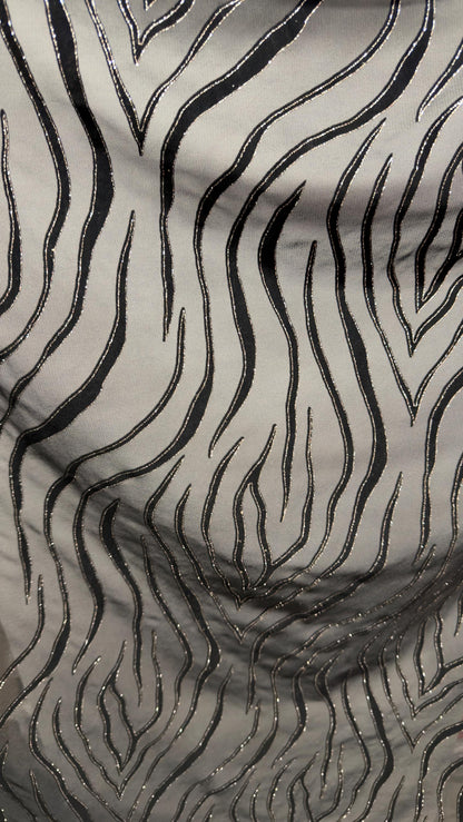Exotic Tiger design on stretch mesh nylon spandex with flocking 4-way stretch 58/60” Sold by the YD. Ships Worldwide from Los Angeles CA USA