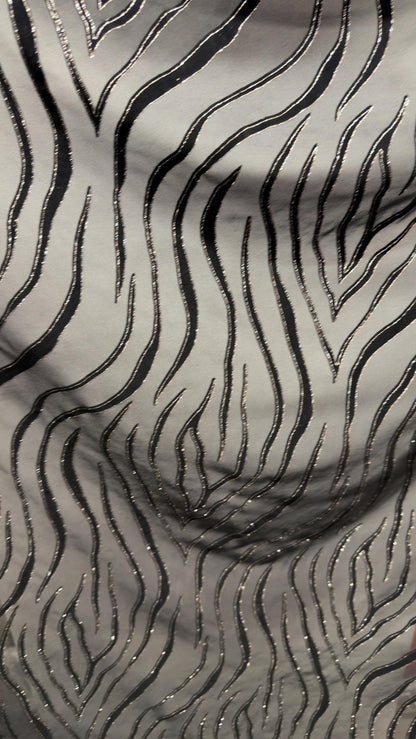 Exotic Tiger design on stretch mesh nylon spandex with flocking 4-way stretch 58/60” Sold by the YD. Ships Worldwide from Los Angeles CA USA
