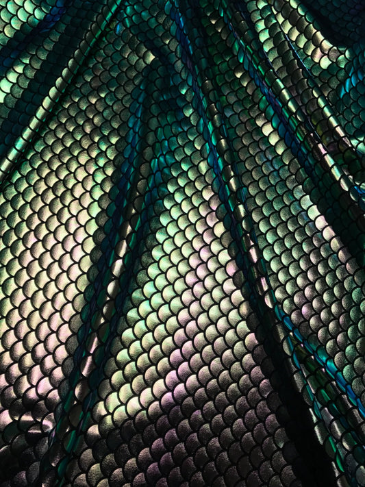 Iridescent green mermaid fish scale design. Spandex Fabric 4way. Sold by the yd.  60" inches