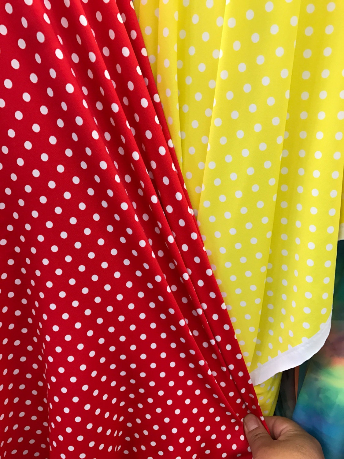 Polka dots print on nylon spandex 4way stretch  58/60" sold by the Yd. Ships worldwide from Los Angeles California USA.