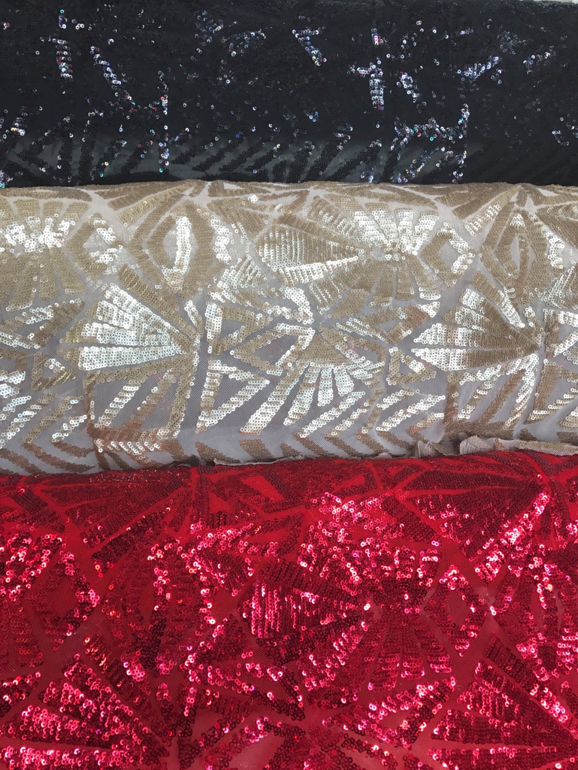 Three Dimensional16 glitz sequins on spandex mesh base 58/60"