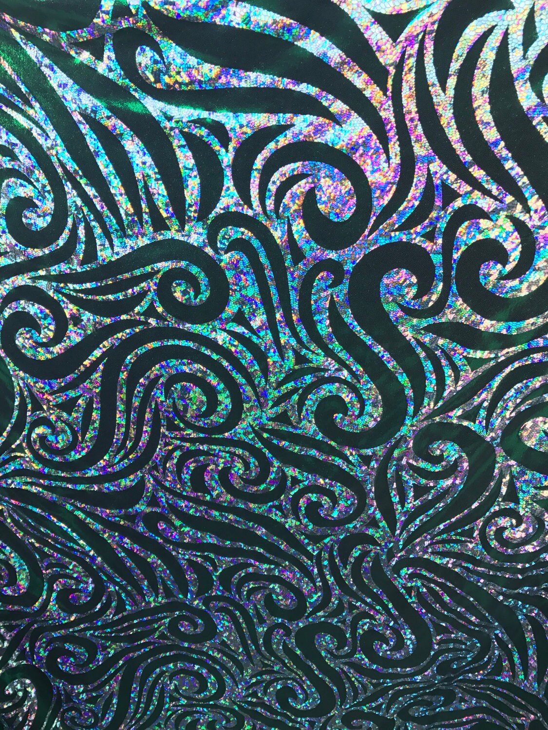 Swirl design Hologram foil green/silver on nylon spandex 4way Stretch 58/60" Sold by the yd. Ships worldwide from Los Angeles California.