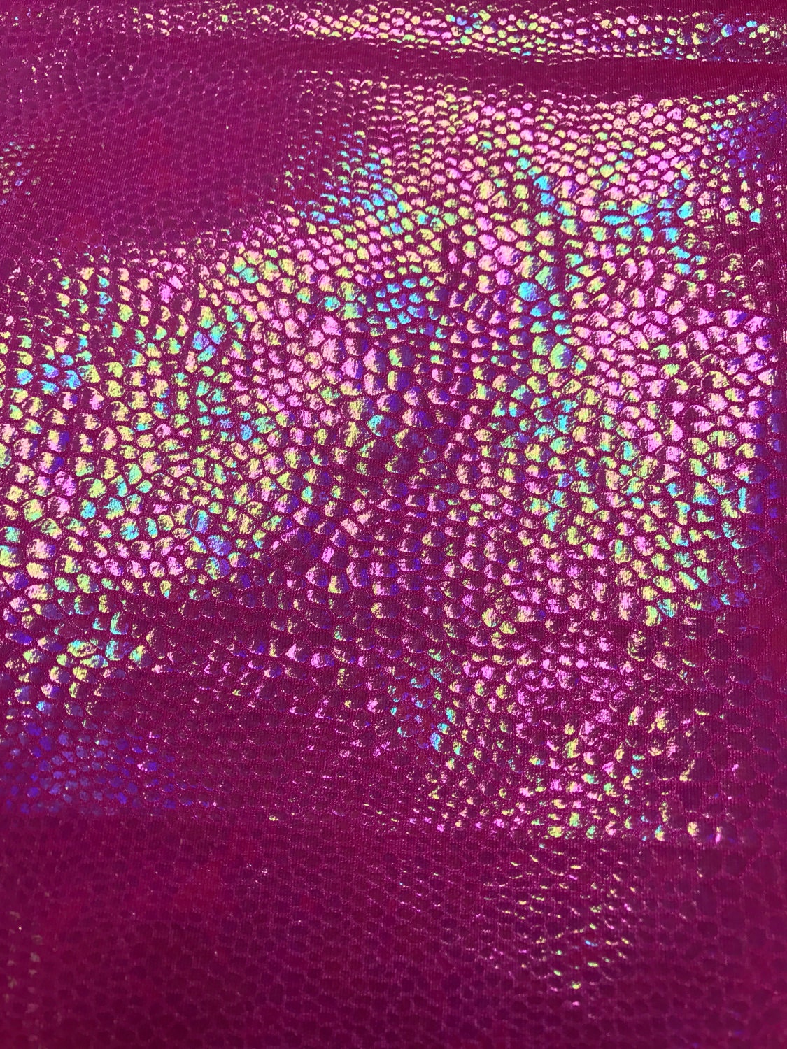 Iridescent snake design with crystal foil on nylon spandex 4way Stretch 58/60" Sold bubthe yd. Ships worldwide from Los Angeles California.