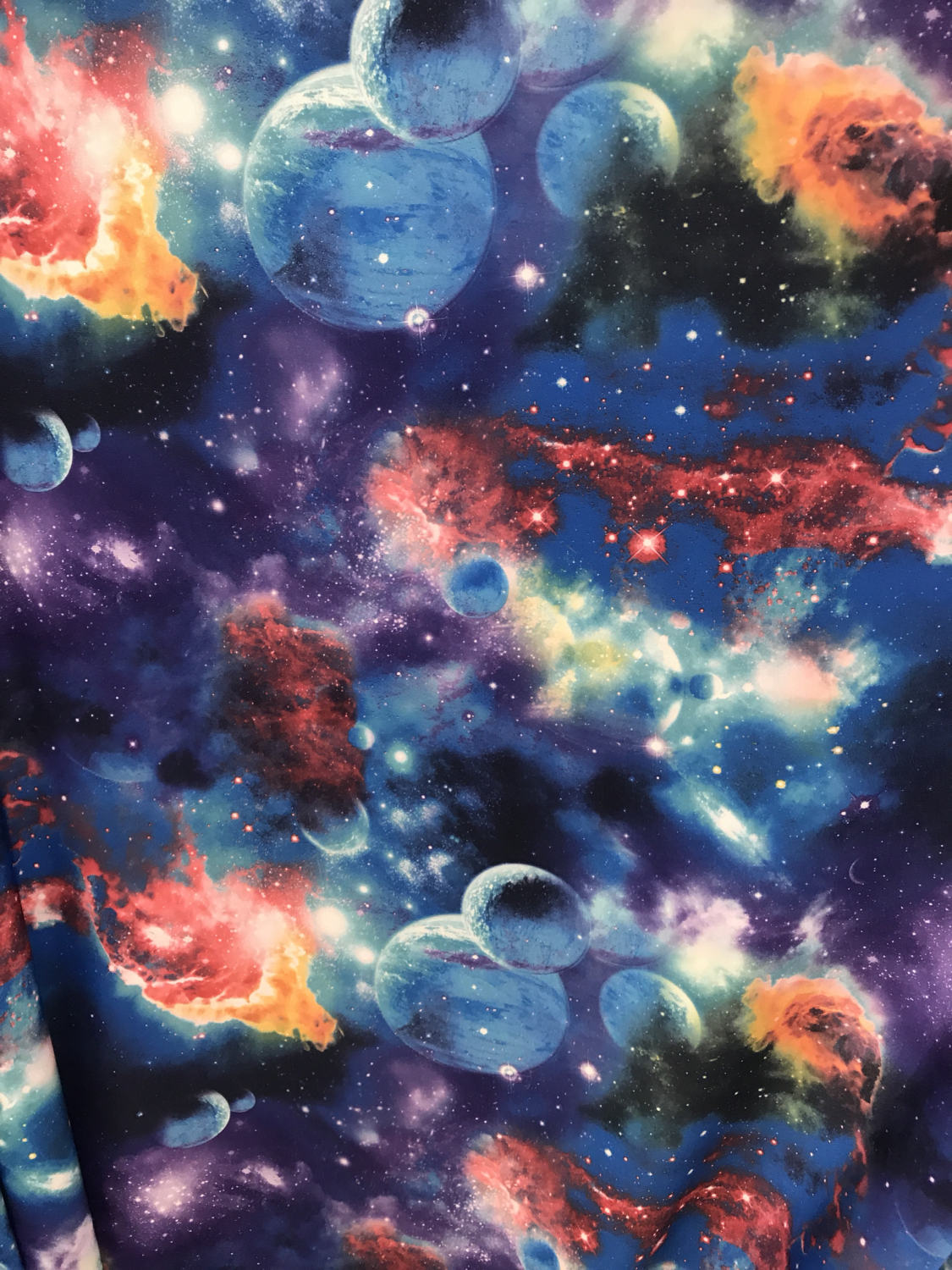 New multicolor galaxy design on nykon spandex 4way Stretch 58/60" Sold bu the yd. Ships worldwide from Los Angeles California USA.