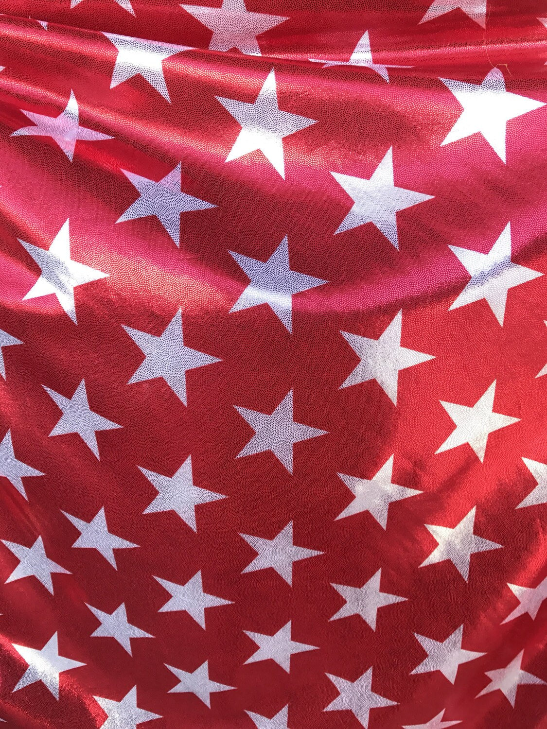 Foggy foil big stars print on nylon spandex 4way 58/60" red/white sold by the yd. Ships worldwide from Los Angeles California USA