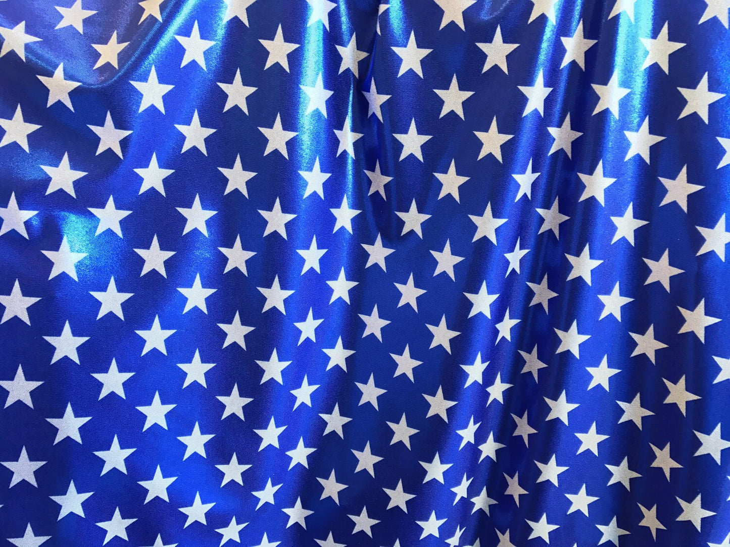 BIG STAR blue/white foggy foil design on nylon spandex 4way stretch 58/60" sold by the yd. Ships worldwide from Los Angeles California USA