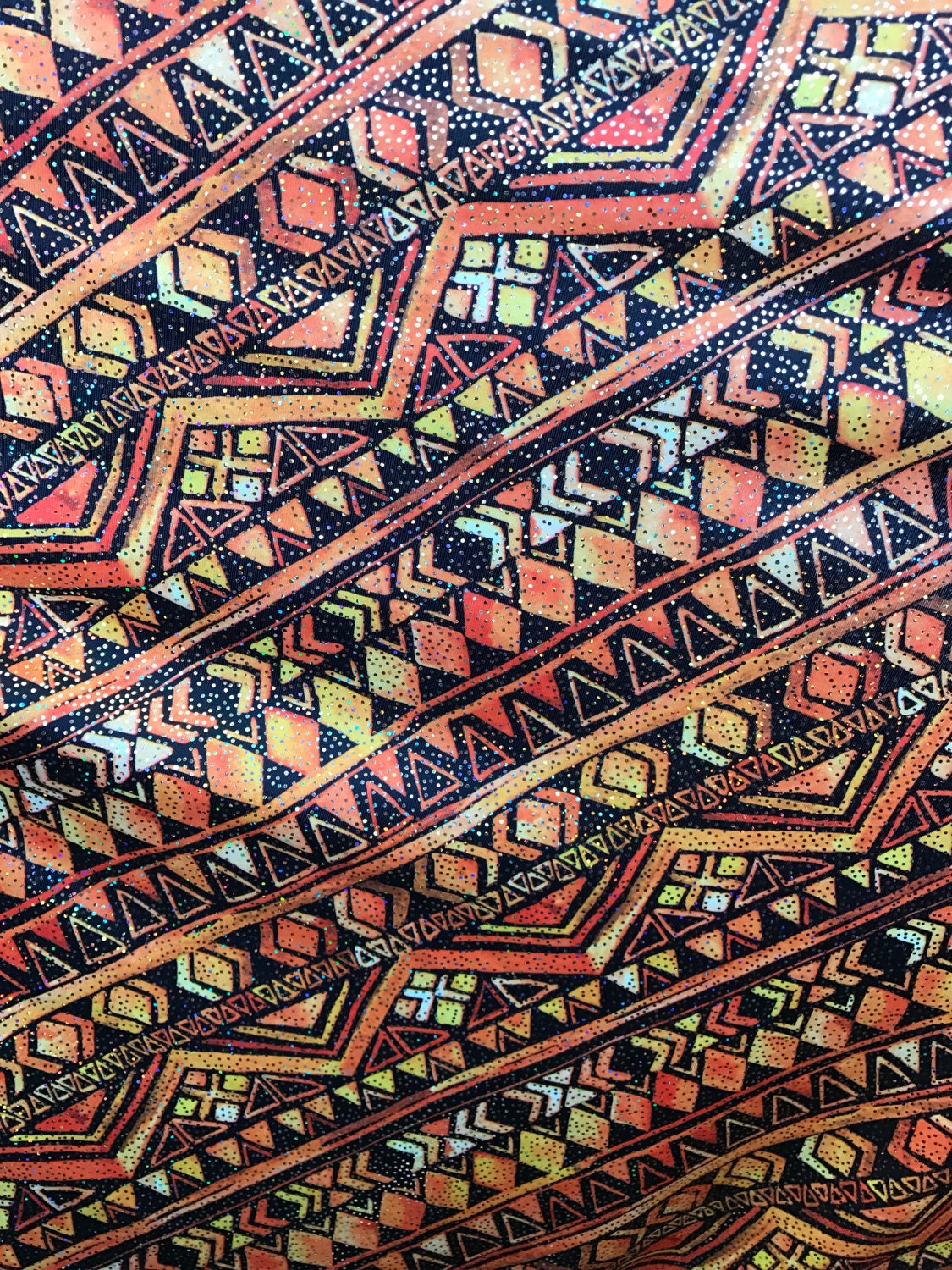 Nylon spandex AZTEC design 4way Stretch with foggy foil 58/60" Sold by the yd Ships worldwide from Los Angeles California USA.