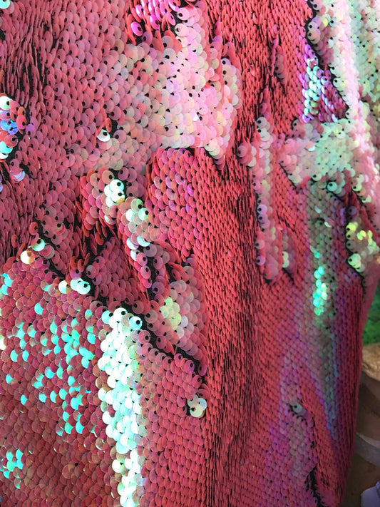 Iridescent flip up sequins dusty rouse reversible sequins on spandex base 58/60" Sold by the yd. Ships worldwide from Los Angeles California