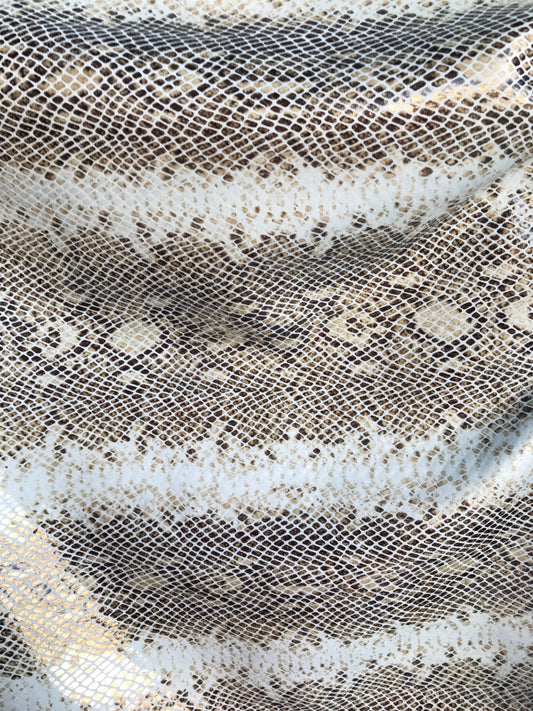 Snake print metallic nylon spandex 4way Stretch 58/60" Sold by the YD. Ships worldwide from Los Angeles California USA