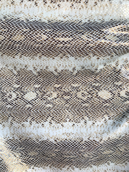 Snake print metallic nylon spandex 4way Stretch 58/60" Sold by the YD. Ships worldwide from Los Angeles California USA