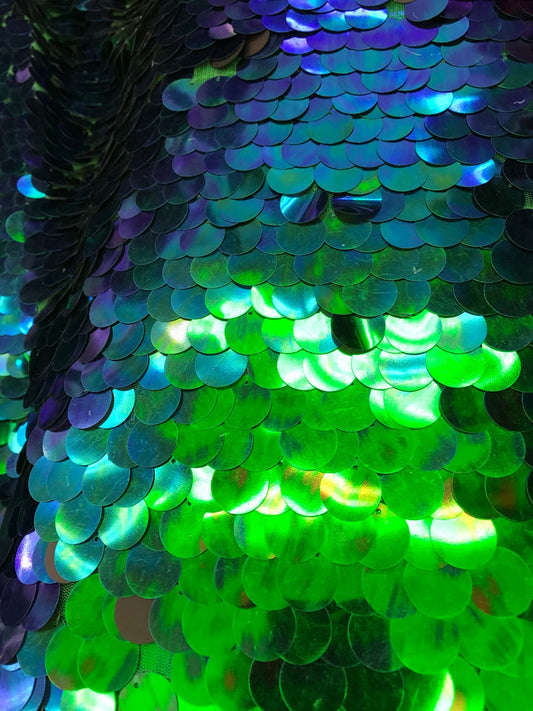 Iridescent mermaid green big paillette sequins on stretch mesh base 2way 58/60"  Sold by the YD. Ships worldwide from Los Angeles California