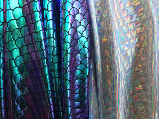 Mermaid Iridescent fish scales hologram metallic on nylon spandex 4way Stretch 58/60" Sold by the YD. Ships worldwide from Los Angeles CA