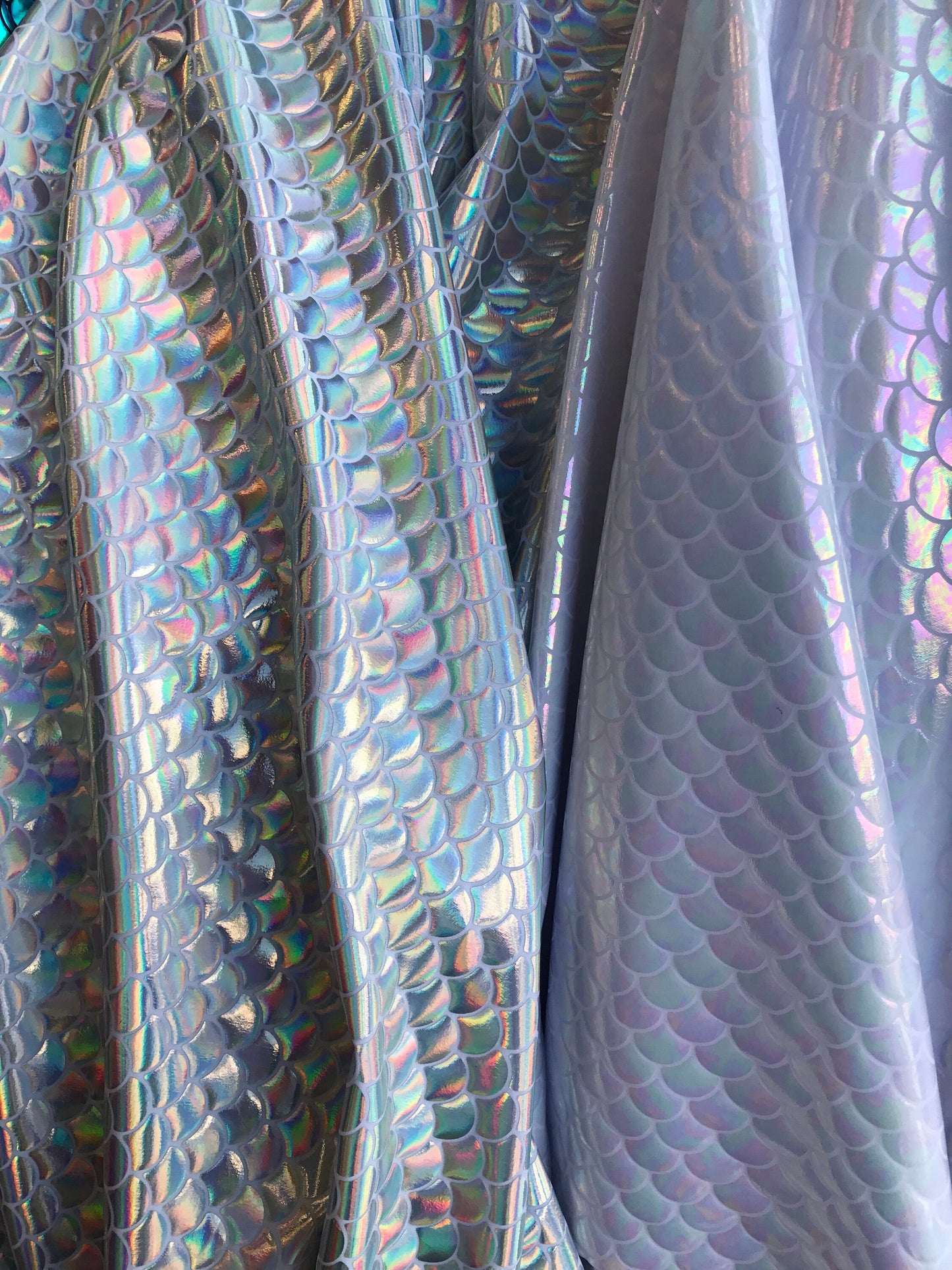 Mermaid Iridescent fish scales hologram metallic on nylon spandex 4way Stretch 58/60" Sold by the YD. Ships worldwide from Los Angeles CA