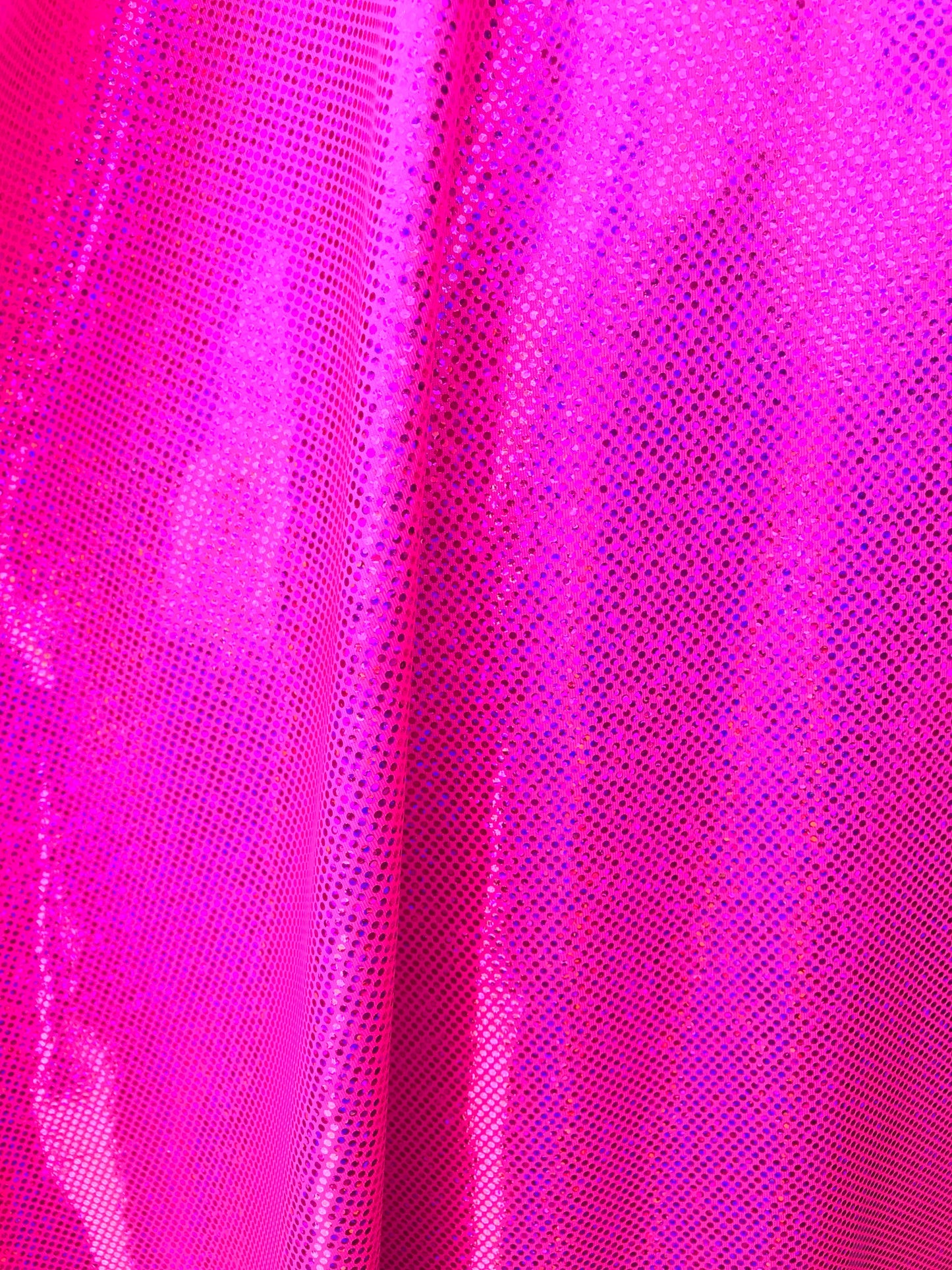 Hologram metallic dots hot pink fushia nylon spandex 4way stretch 58/60" Sold by the YD. Ships worldwide from Los Angeles California USA