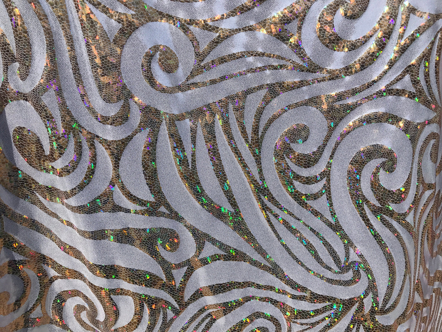 NEW Swirl metallic Hologram design on nylon spandex 4way Stretch 58/60" Sold by the YD. Ships worldwide from Los Angeles California USA