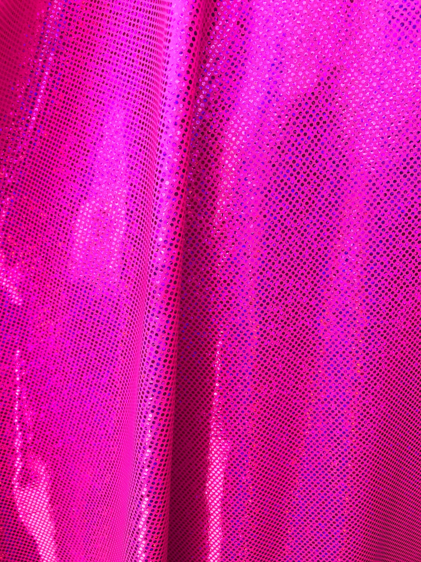 Hologram metallic dots hot pink fushia nylon spandex 4way stretch 58/60" Sold by the YD. Ships worldwide from Los Angeles California USA