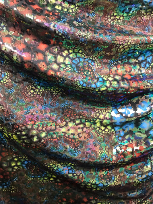 New animal print iridescent foil all over Hologram nylon spandex 4way stretch 58/60" Sold by the YD. Ships worldwide from Los Angeles CA