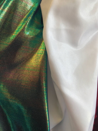 Foggy foil iridescent green & white clear metallic nylon spandex 4way 58/60" Sold by the YD. Ships worldwide from Los Angeles CA