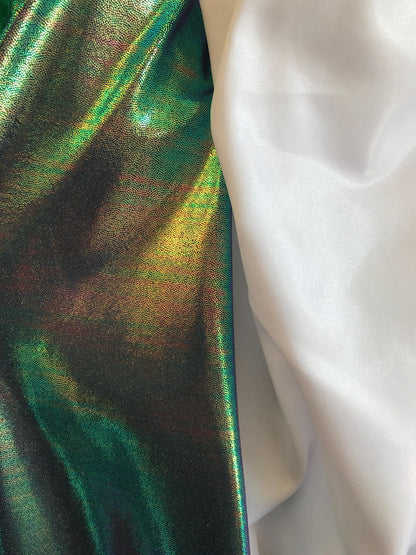 Foggy foil iridescent green & white clear metallic nylon spandex 4way 58/60" Sold by the YD. Ships worldwide from Los Angeles CA