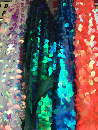 Nice iridescent teardrops jumbo size Sequins ok stretch mesh 2way stretch 58/60" Sold by the YD. Ships worldwide from Los Angeles California