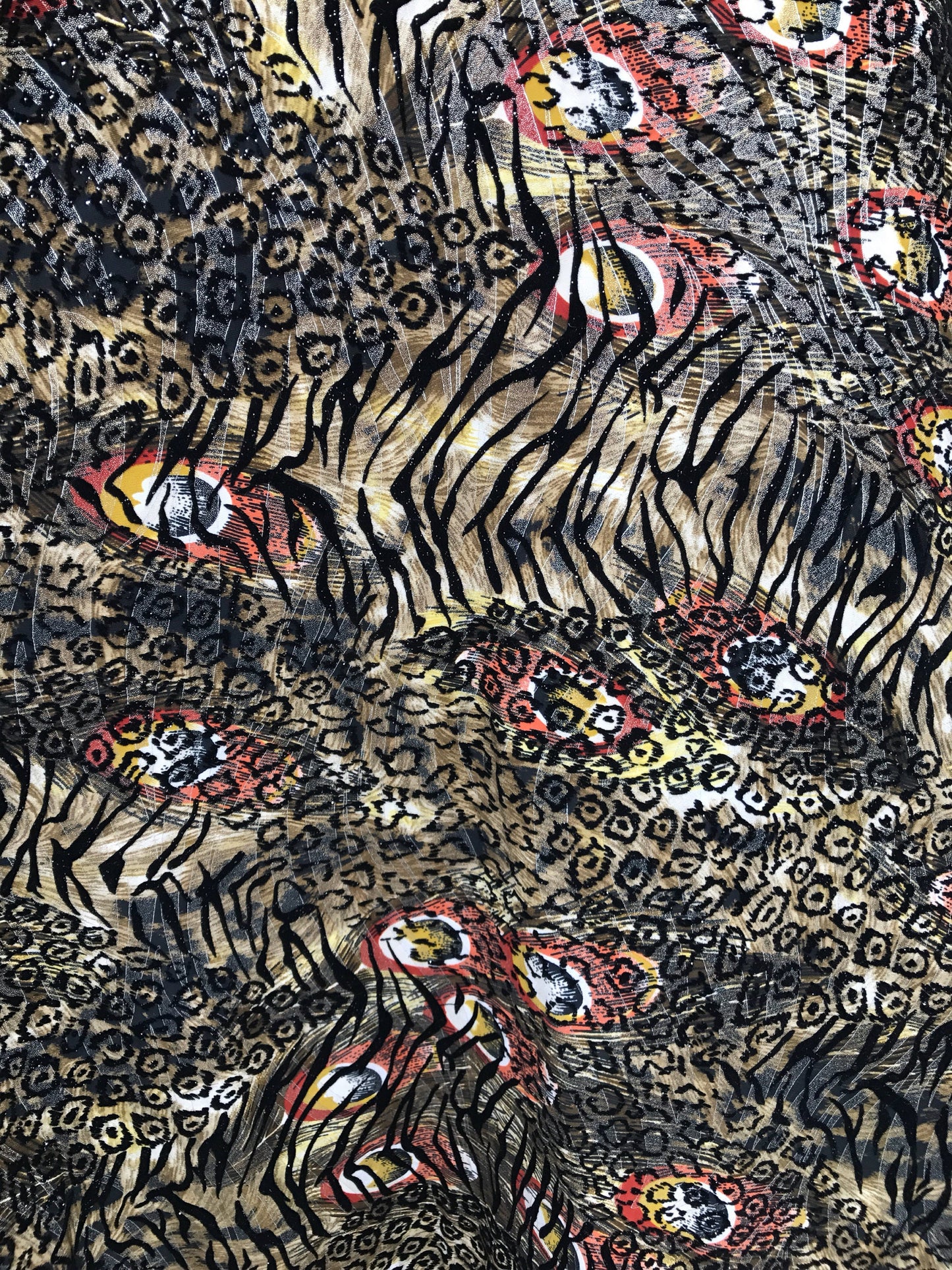 New nylon spandex animal print design with black flocking 2way stretch 58/60" Sold by the YD. Ships worldwide from Los Angeles California.