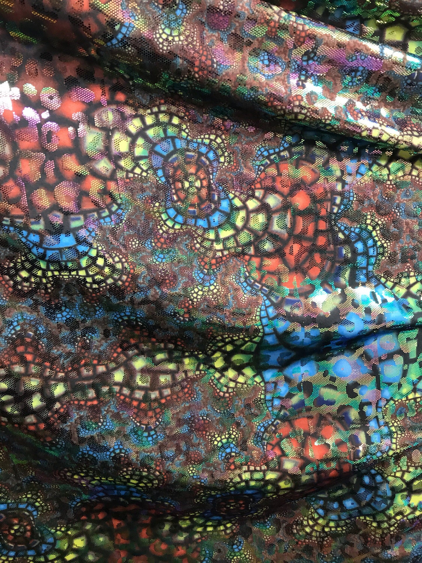 New animal print iridescent foil all over Hologram nylon spandex 4way stretch 58/60" Sold by the YD. Ships worldwide from Los Angeles CA