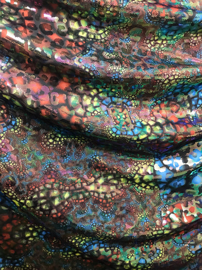 New animal print iridescent foil all over Hologram nylon spandex 4way stretch 58/60" Sold by the YD. Ships worldwide from Los Angeles CA