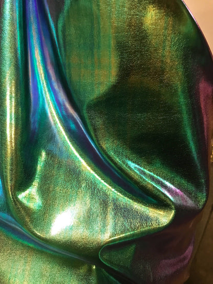 New Iridescent all over foil blue/green nylon spandex 4way Stretch 58/60" Sold by the YD. Ships worldwide from Los Angeles California USA