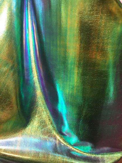 New Iridescent all over foil blue/green nylon spandex 4way Stretch 58/60" Sold by the YD. Ships worldwide from Los Angeles California USA