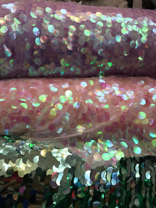 Iridescent sequins paillette design 20mm sequins size mesh base 58/60" 2way stretch. Sold bu the YD. Ships worldwide from Los Angeles CA