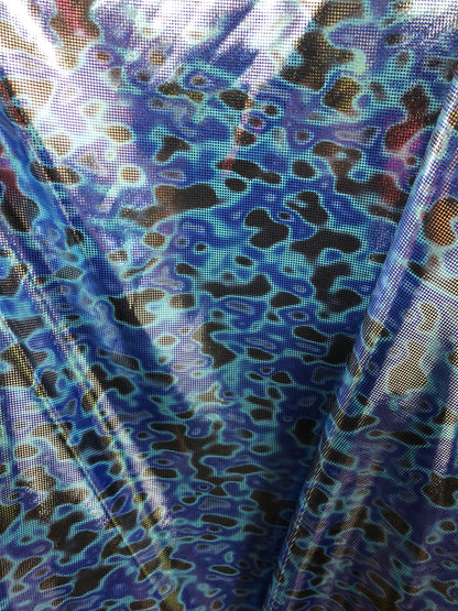 New Lava design with silver foil dots in nylon spandex 4way stretch 58/60" Sold by the YD. Ships worldwide from Los Angeles CA USA