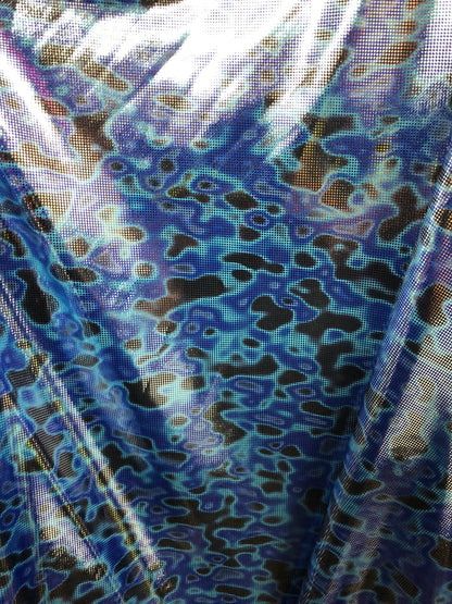 New Lava design with silver foil dots in nylon spandex 4way stretch 58/60" Sold by the YD. Ships worldwide from Los Angeles CA USA