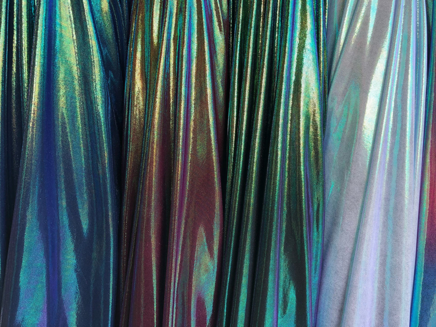 New iridescent foggy foil on nylon spandex 4way stretch 58/60" Sold by the YD. Ships worldwide from Los Angeles California USA