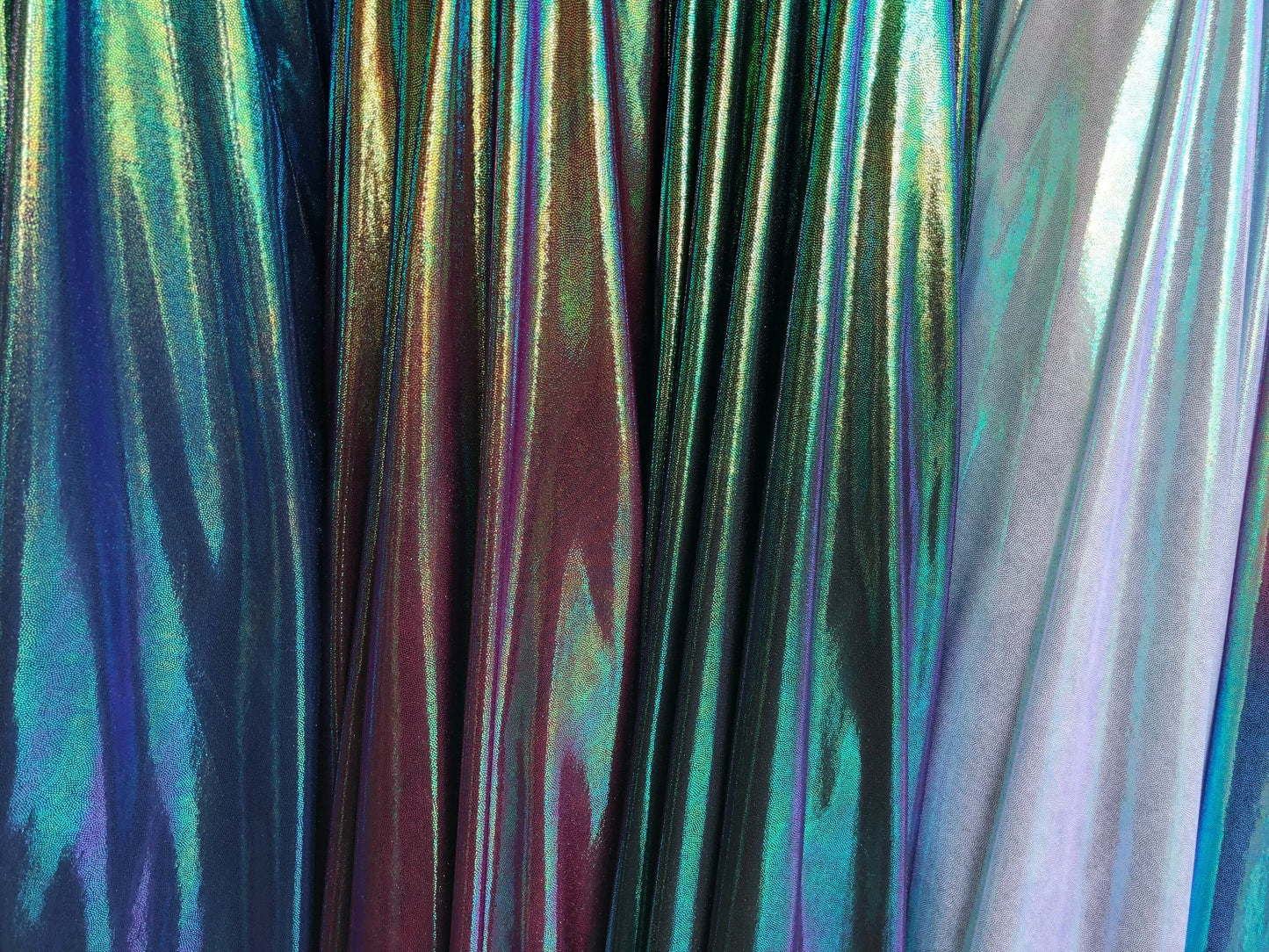 New iridescent foggy foil on nylon spandex 4way stretch 58/60" Sold by the YD. Ships worldwide from Los Angeles California USA