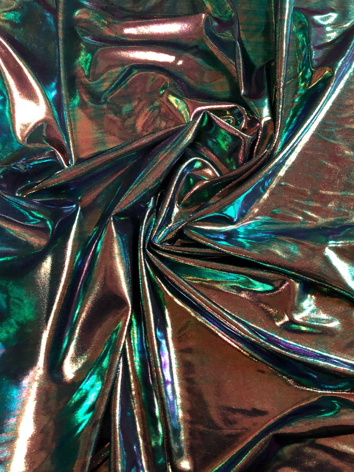 New Iridescent foggy foil oil effect metallic nylon spandex 4way stretch Sold by the YD. Ships worldwide from Los Angeles California USA