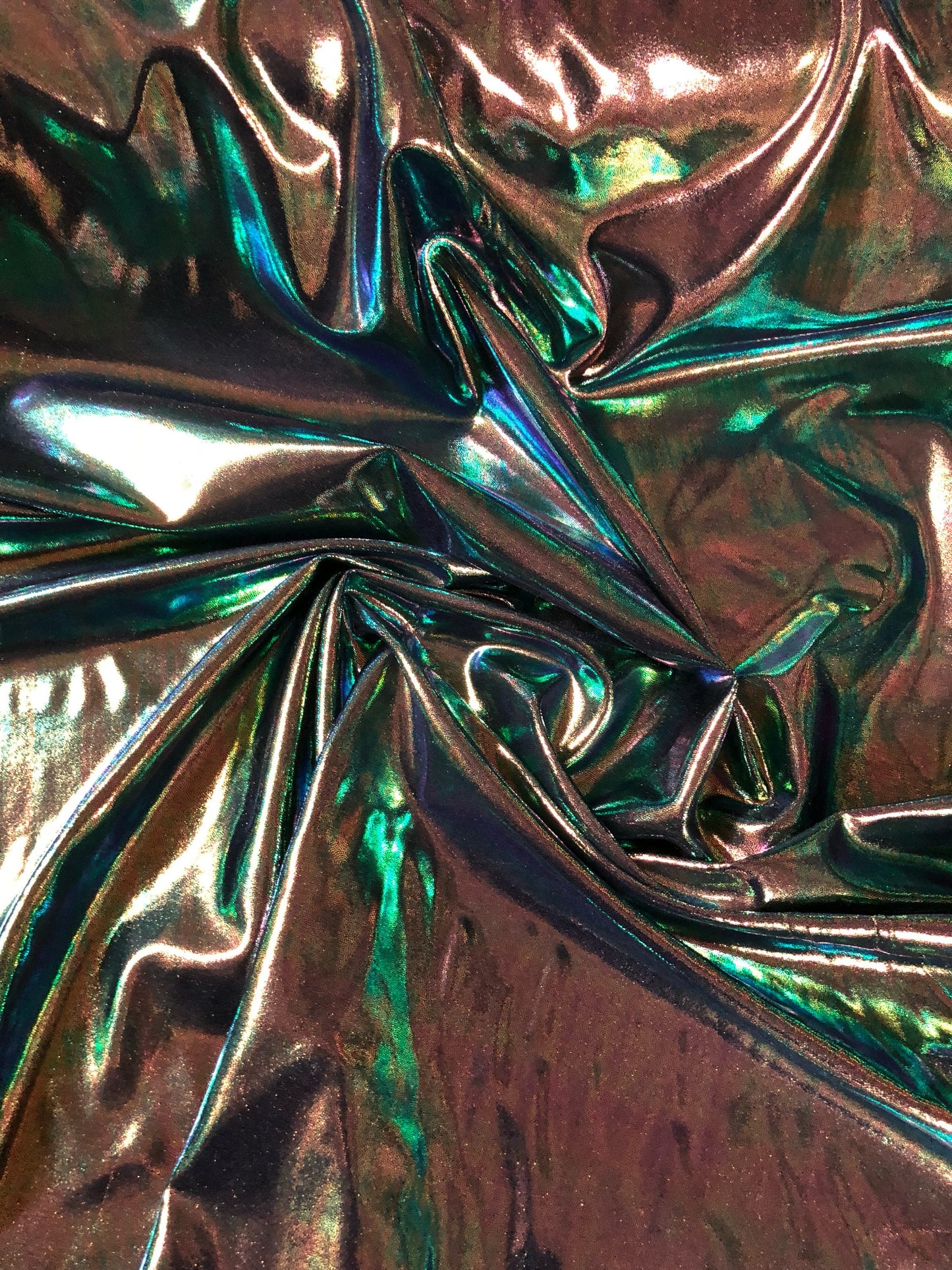 New Iridescent foggy foil oil effect metallic nylon spandex 4way stretch Sold by the YD. Ships worldwide from Los Angeles California USA