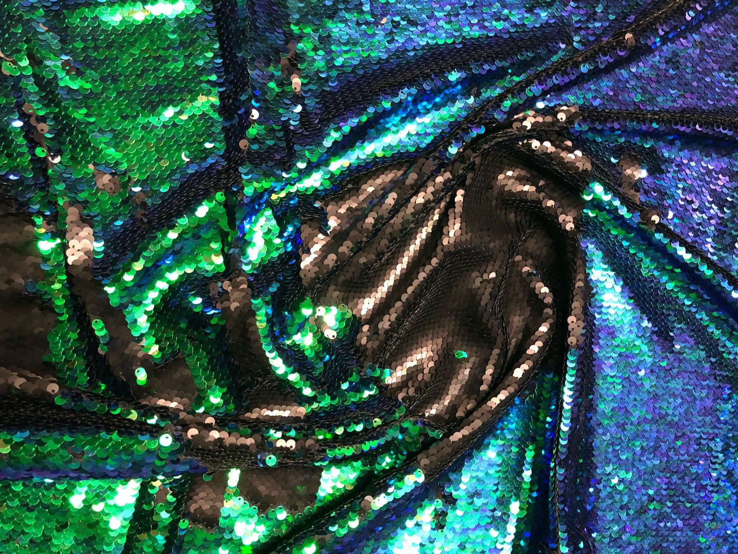 New flip up sequins reversible sequins green/black spandex base 2way strech 58/60" Sold by the YD. Ships worldwide from Los Angeles CA USA