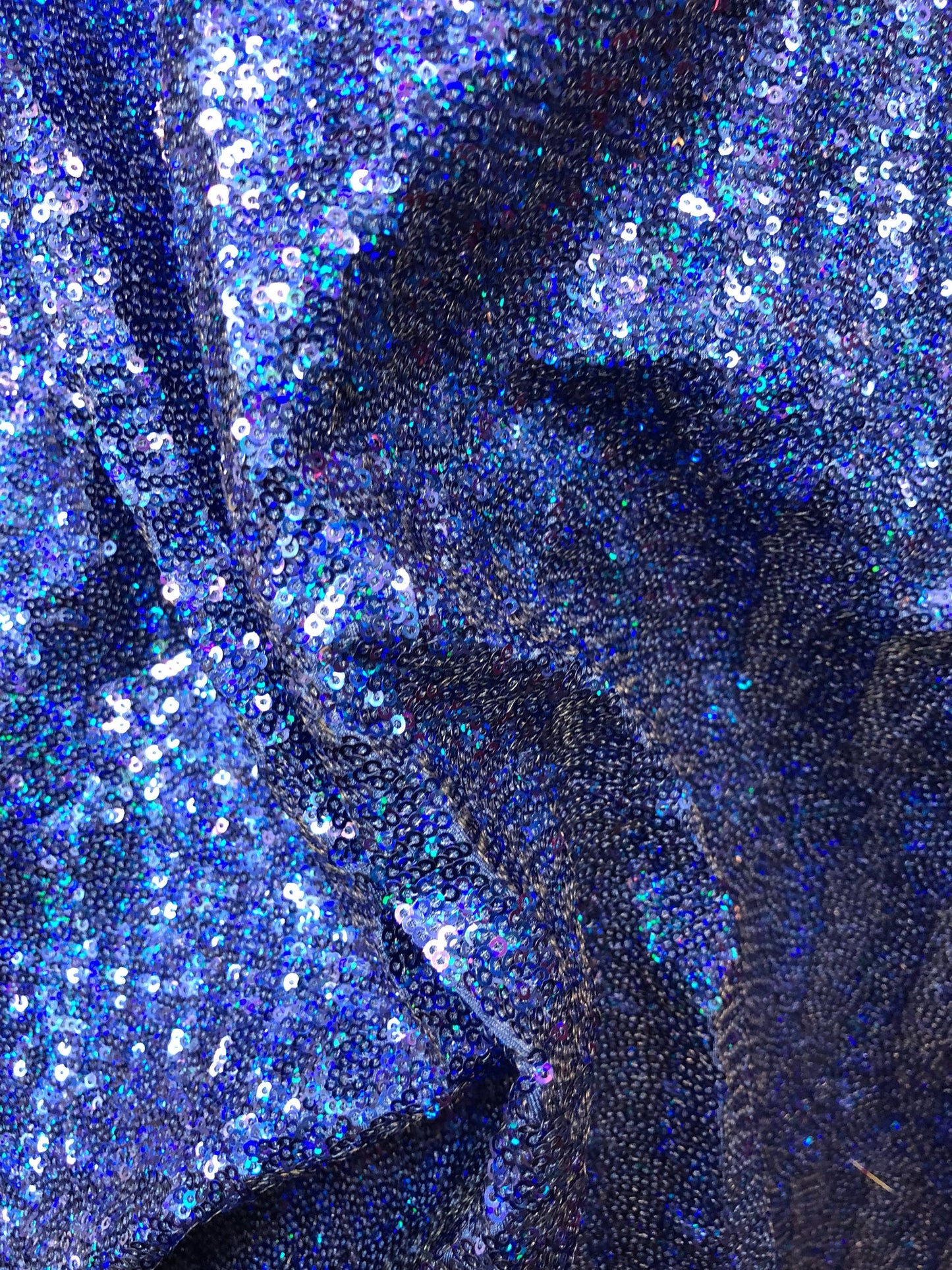 New mini glitz sequins on heavy spandex base 4 way stretch 58/60" Sold by the YD. Ships worldwide from Los Angeles California USA.