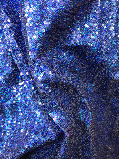 New mini glitz sequins on heavy spandex base 4 way stretch 58/60" Sold by the YD. Ships worldwide from Los Angeles California USA.