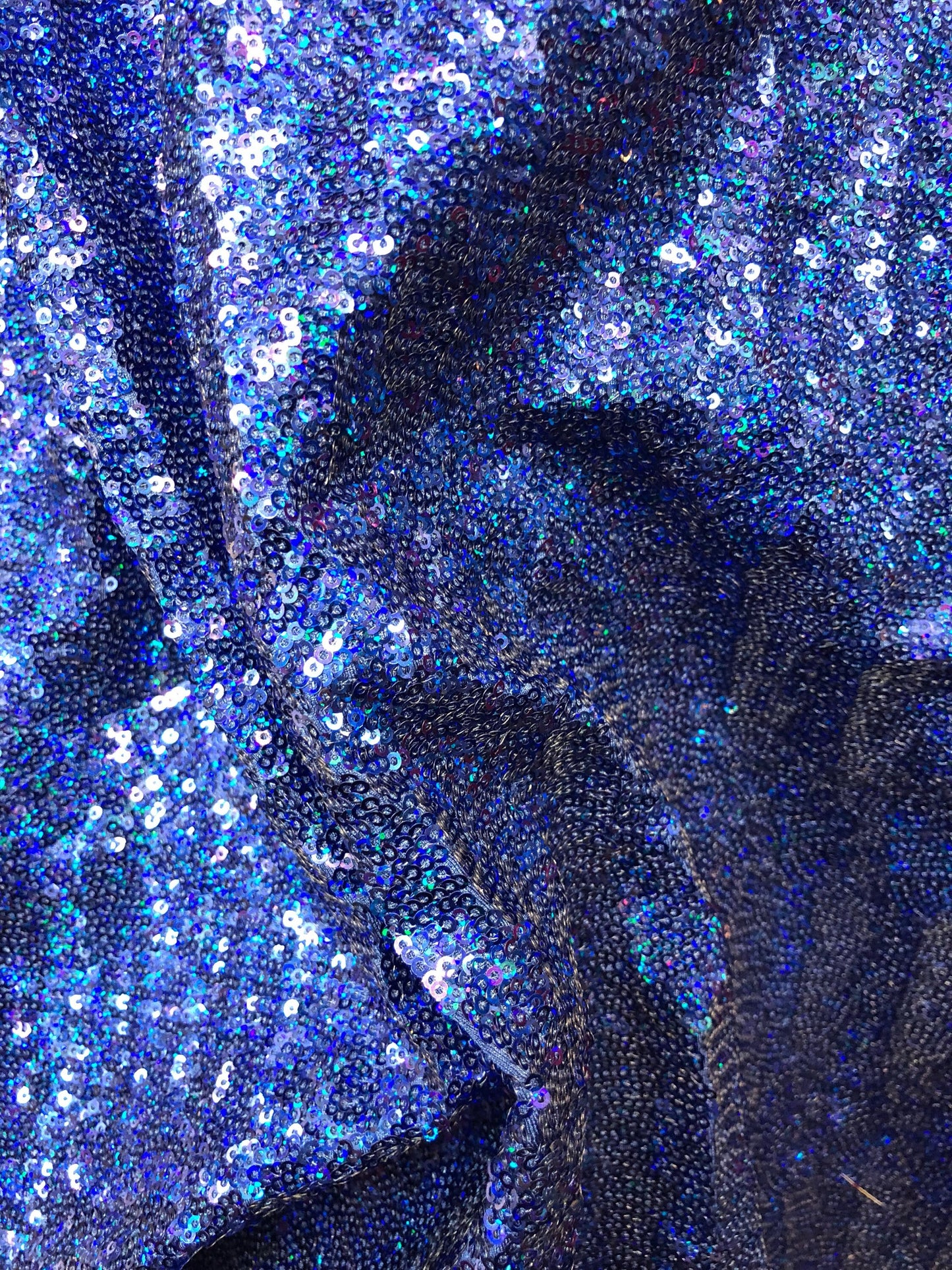 New mini glitz sequins on heavy spandex base 4 way stretch 58/60" Sold by the YD. Ships worldwide from Los Angeles California USA.