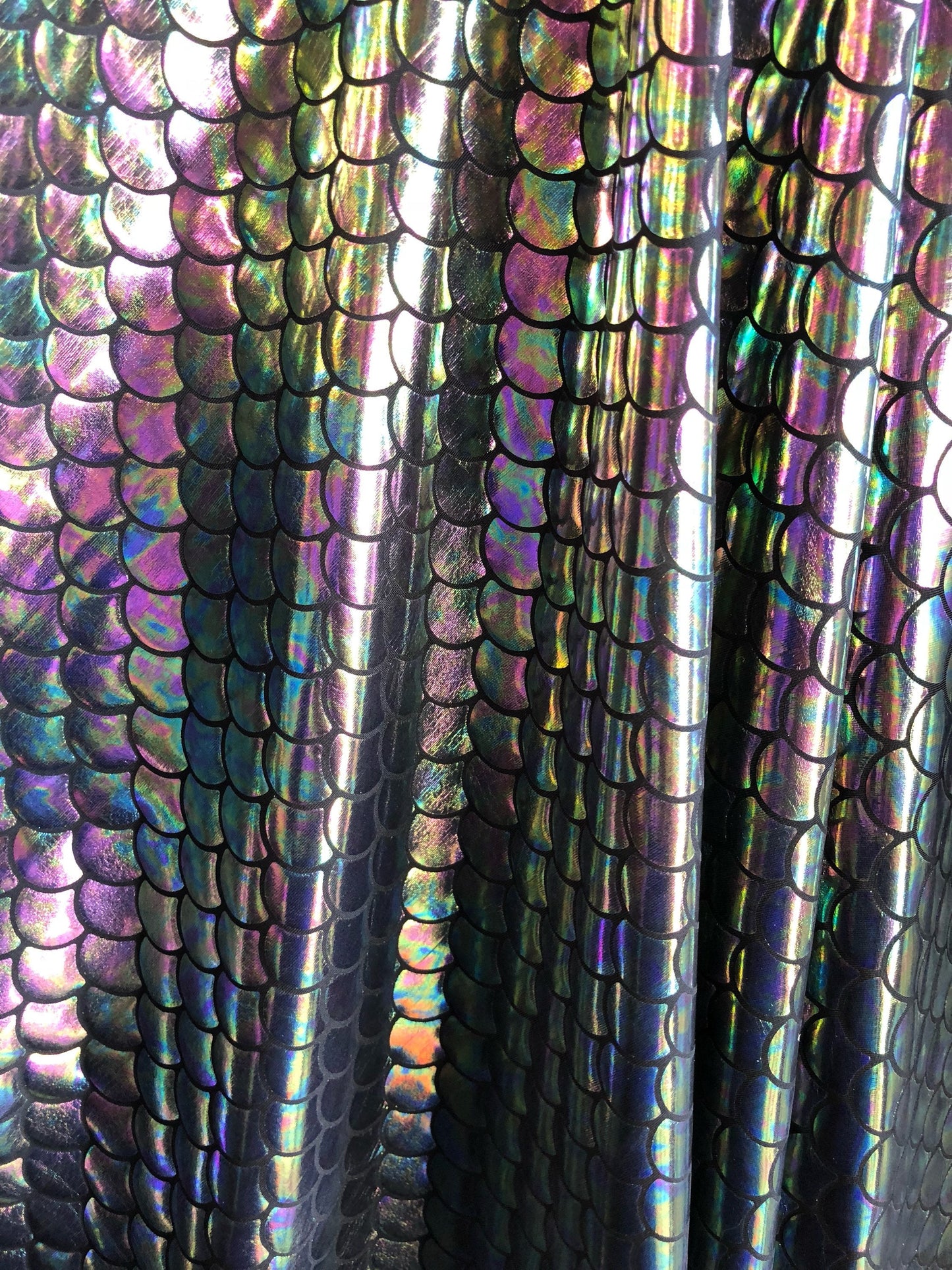 New iridescent pewter mermaid design on nylon spandex 4way Stretch 58/60" Sold bu the YD. ships worldwide from Los Angeles California USA